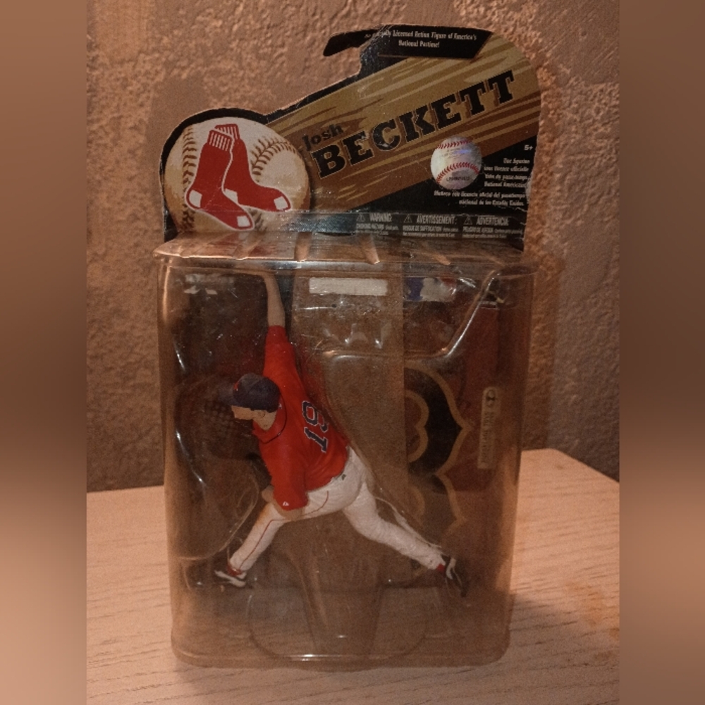 Red and White Baseball Action Figure